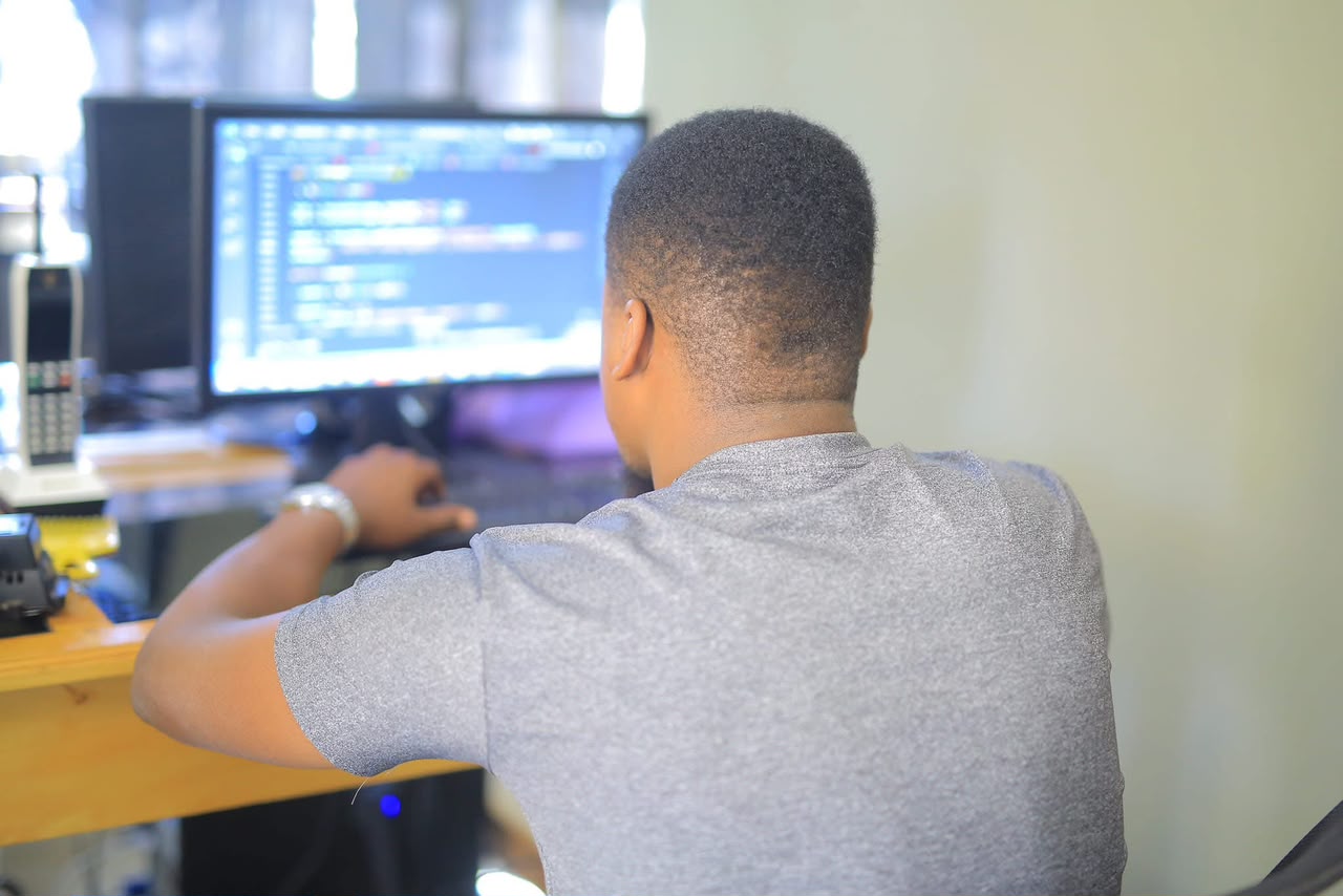 Developer writing code for a business website